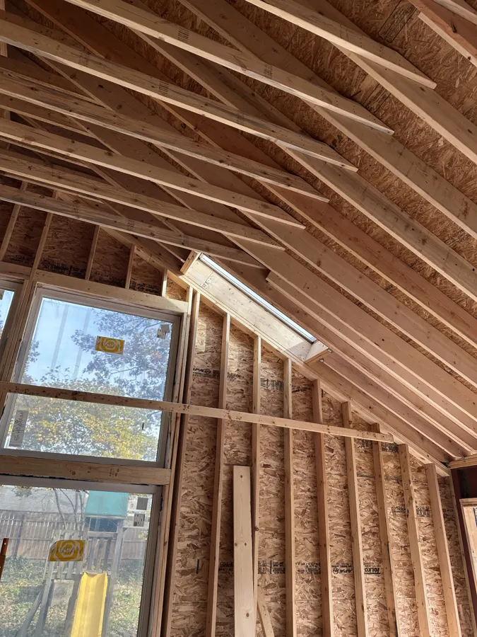 Framed vaulted ceiling with skylight